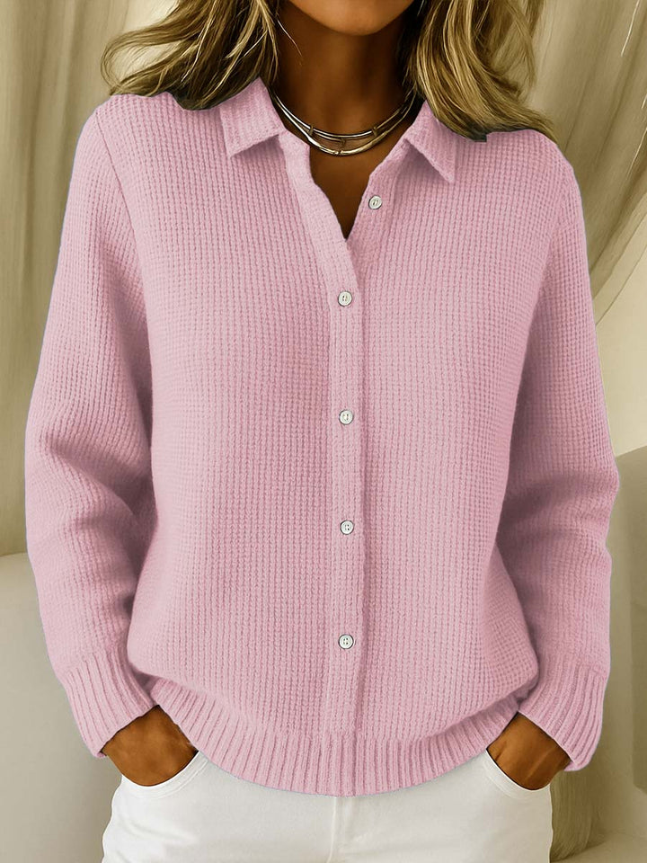 Effortless women's long sleeve button-front collared sweater. Comfortable and chic for versatile autumn wear.