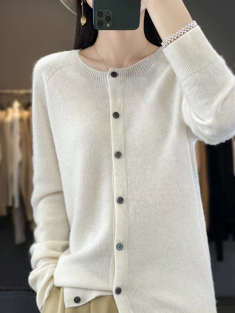 Fashion knit women's cardigan. Stylish button front sweater, a versatile layering piece for any outfit.