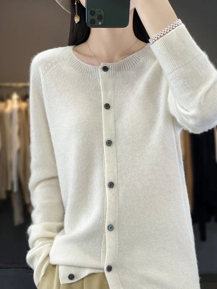 Fashion knit women's cardigan. Stylish button front sweater, a versatile layering piece for any outfit.