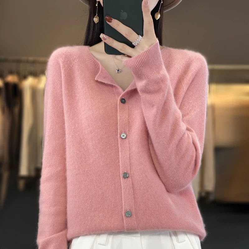 Women's cozy knit cardigan. Button front long sleeve sweater offering stylish comfort and versatility.