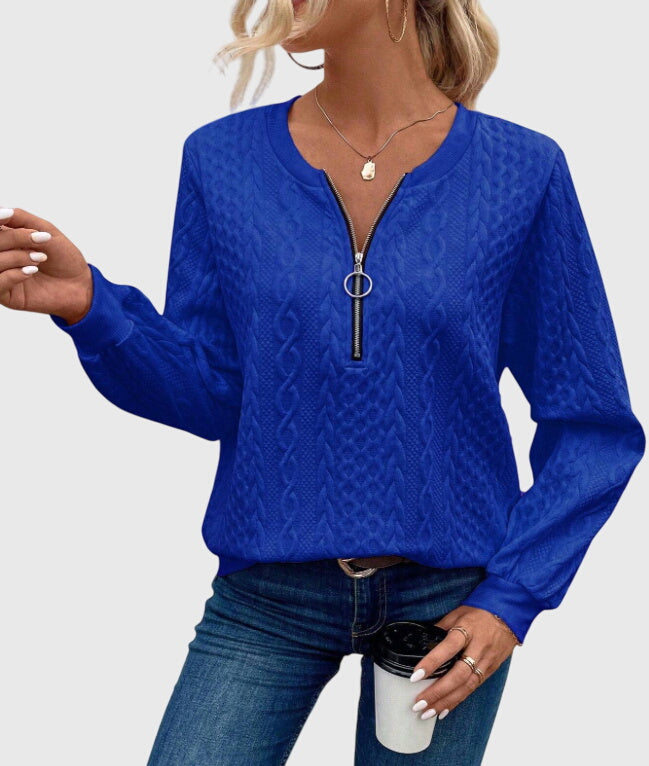 Warm and stylish women's cable knit quarter-zip sweater, a versatile piece for your closet.