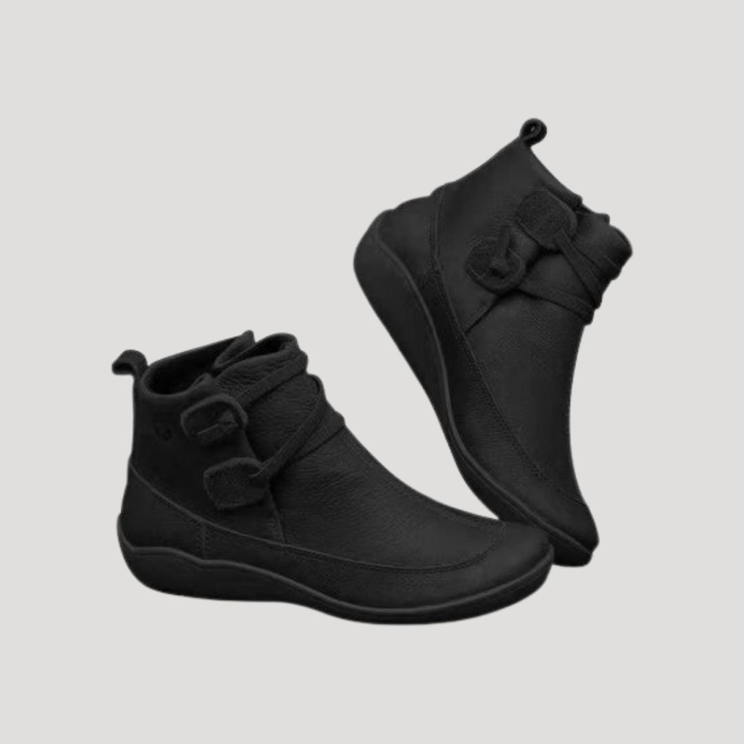 Pair of womens ankle strap boots in a light tan, showcasing their comfortable design suitable for spring footwear.