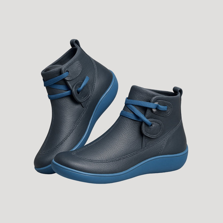 Side view of a women's fashion ankle boot with multiple straps, highlighting its versatile and trendy design for spring.