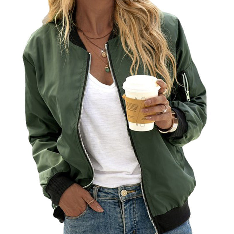Close-up of a women's bomber jacket, showing the zip-up detail and fabric texture, a chic choice for casual outfits