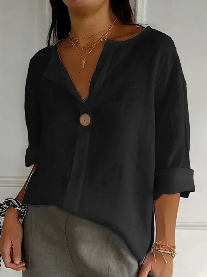 Stylish women's button-front tunic blouse, V-neck, 3/4 sleeve, loose fit for casual summer, vacation & relaxed wear.