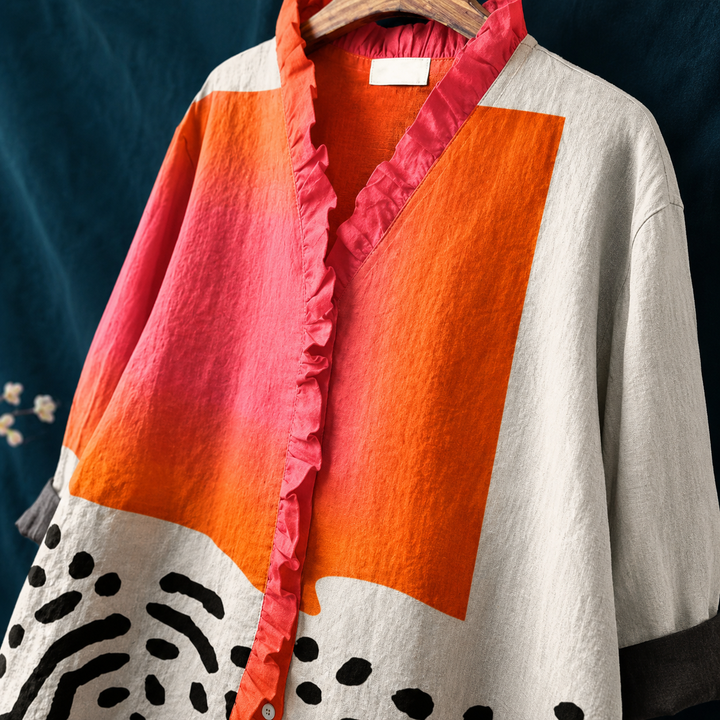 Boho chic women's blouse featuring a relaxed fit, abstract print & button-up front. Versatile for summer fashion.