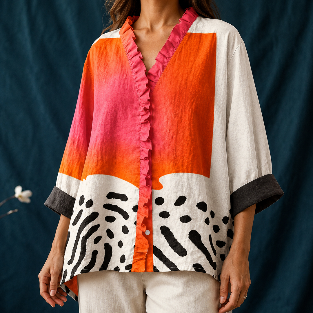 Patterned women's long-sleeve blouse with a vibrant abstract block print & relaxed, comfortable fit for fashion.