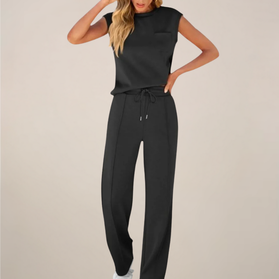 Women's casual drawstring pants and matching long-sleeve top set in a relaxed fit.