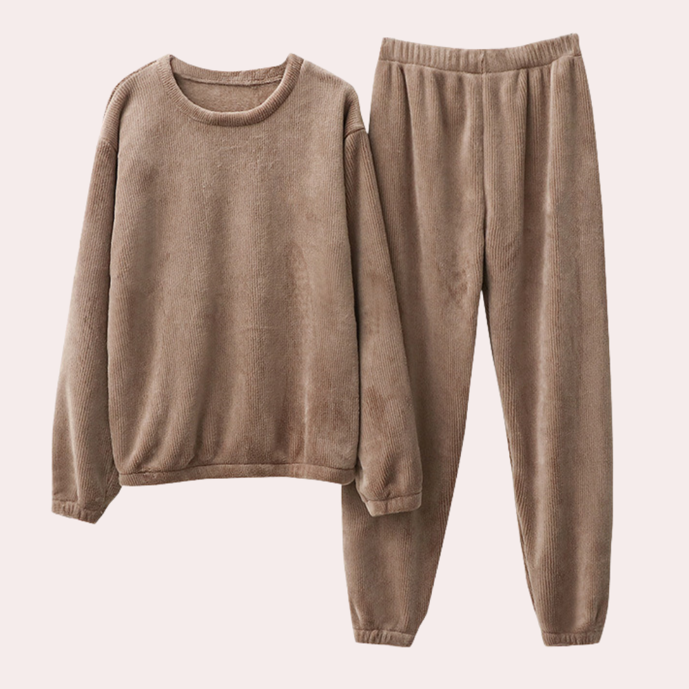 Women's casual fleece lounge set in a neutral color, perfect for cozy winter wear and relaxed fit athleisure.