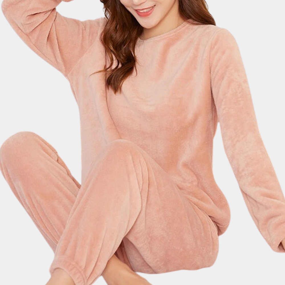 Full shot of a women's two-piece fleece set, showcasing the relaxed fit and casual style for lounging.