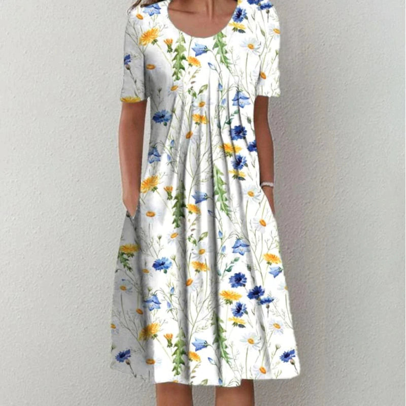 Comfortable and elegant women's floral dress with short sleeves and pockets, ideal for casual daily wear.