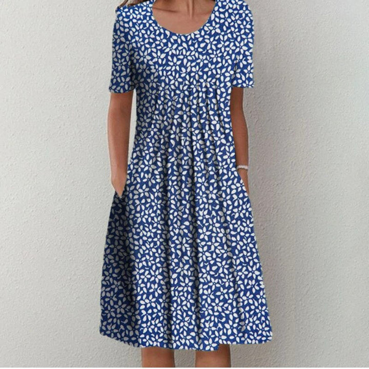 Soft & comfortable women's casual floral short sleeve dress with pockets, perfect for spring & summer.