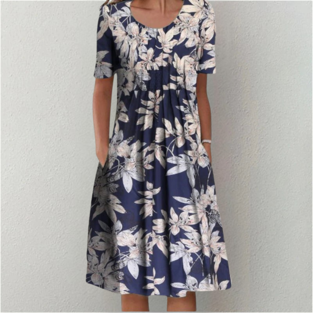 Versatile women's short sleeve floral dress with pockets, an elegant and comfortable choice for spring & summer.