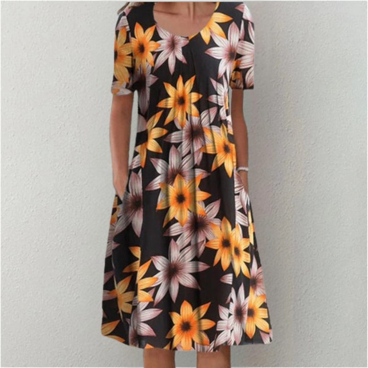 Everyday elegant women's floral dress with short sleeves and pockets, ideal comfortable casual daily wear.