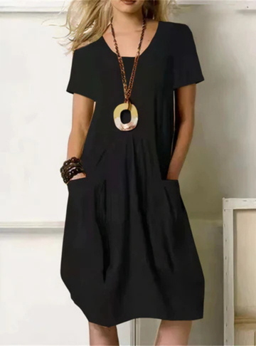 Versatile women's midi dress with gathered details & practical pockets. Ideal for casual spring & summer fashion, relaxed fit.
