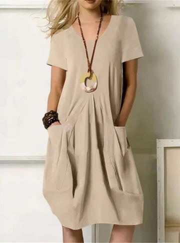 Comfortable women's casual midi dress with pockets. Relaxed fit, gathered design, short sleeves for spring & summer style.