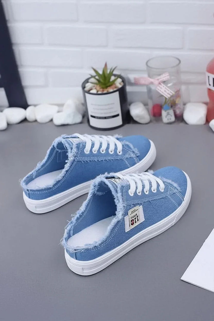 Women's casual high-top sneakers, ideal for everyday style & streetwear. Lace-up design for comfort.
