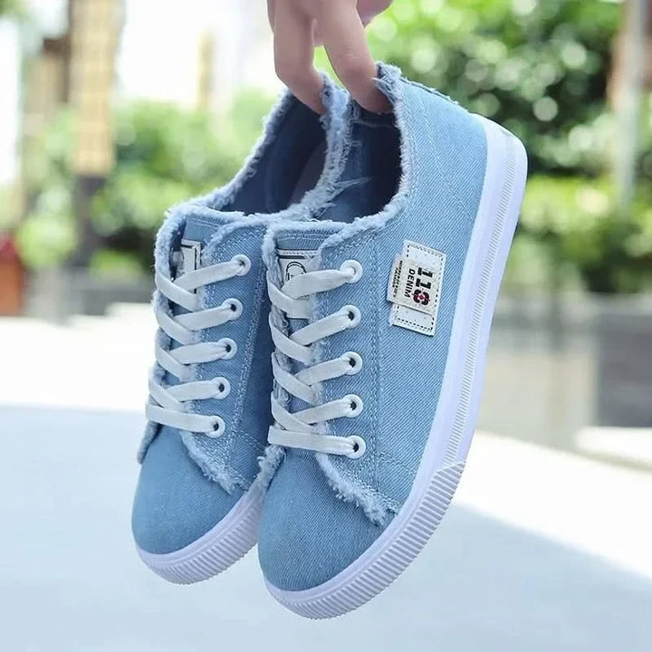 Stylish women's high-top casual sneakers, perfect for daily wear. Offers supportive comfort & a trendy look.