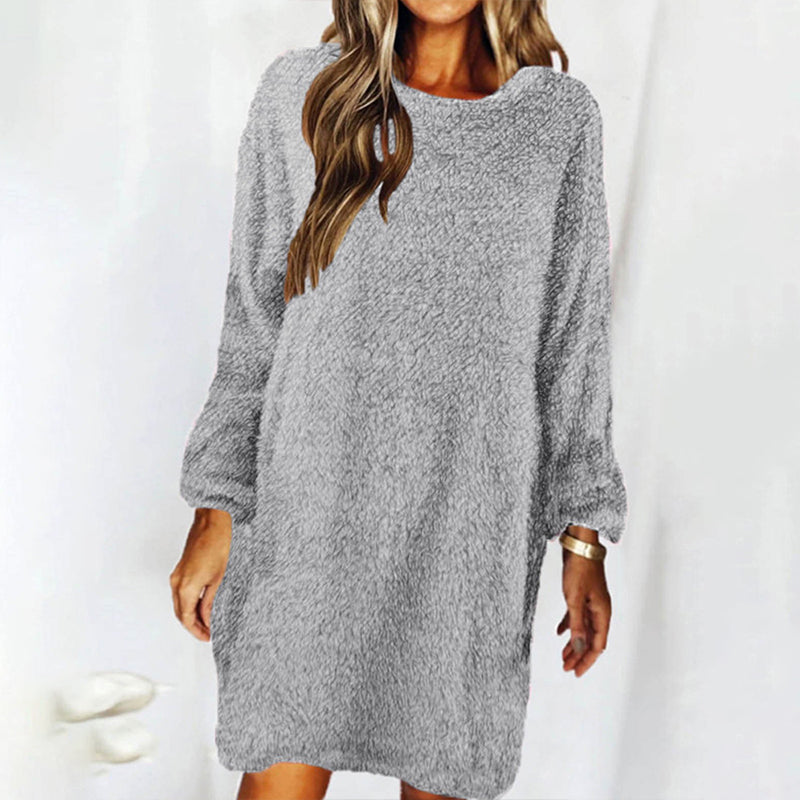 Black long sleeve pocket dress for women, designed for casual comfort and versatile styling