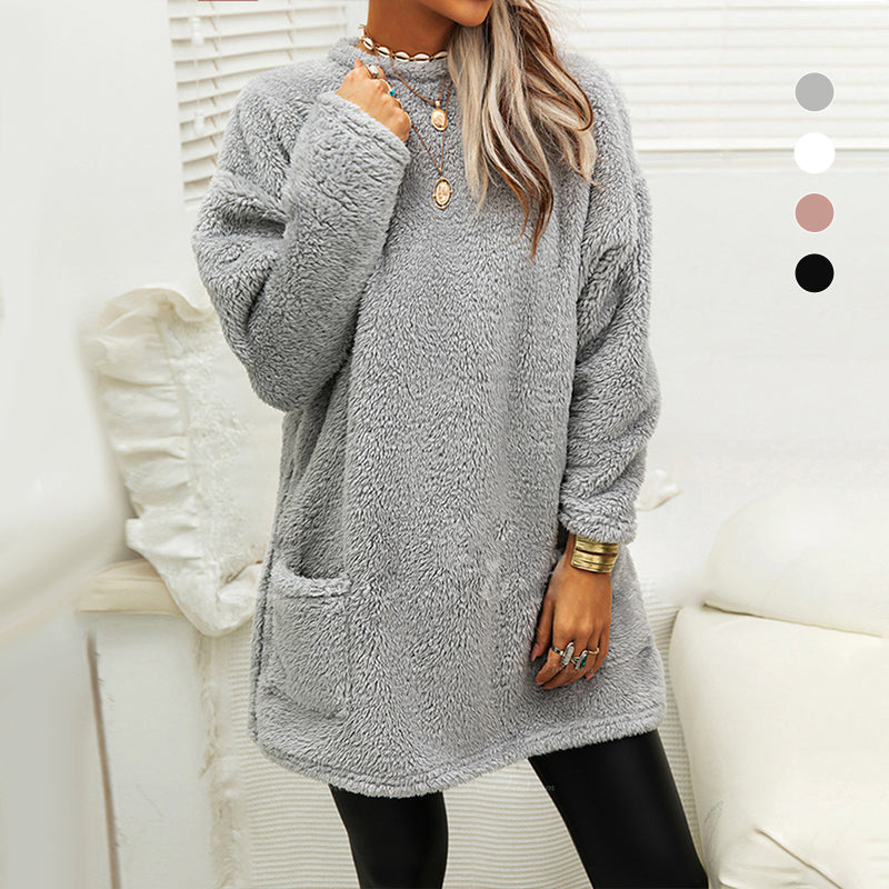 Detail of the crew neck collar on a black long sleeve casual t-shirt dress for women