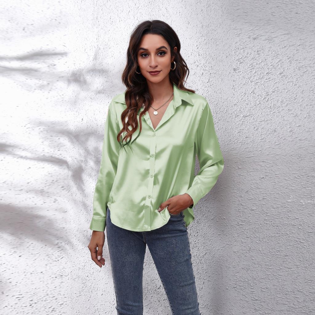Model wearing a women's elegant loose fit satin blouse, showcasing its flowy design and casual appeal