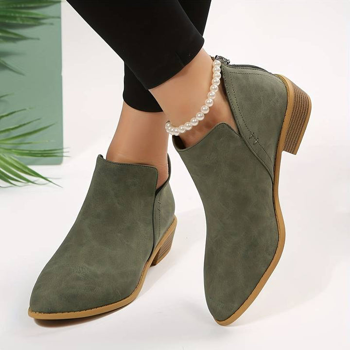 Women's casual low heel slip-on ankle boots in black for comfortable everyday wear