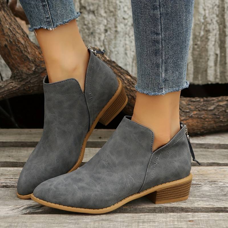 Stylish women's slip-on low heel boots, perfect for casual autumn fashion