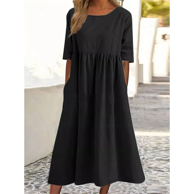 Stylish women's summer maxi dress, comfortable and relaxed-fit, featuring half-sleeves & pockets.