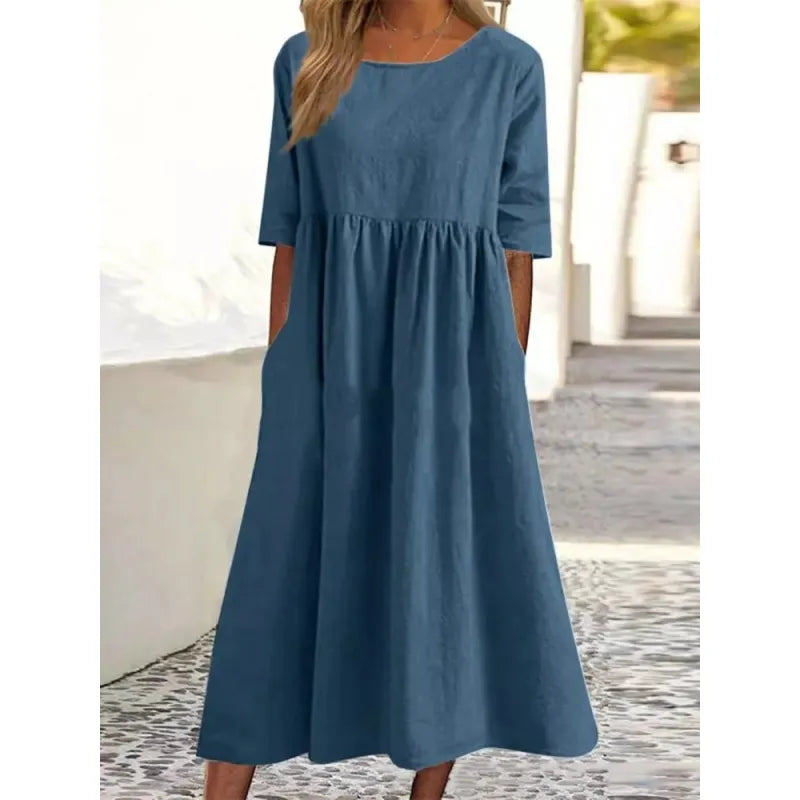 Modest ankle-length maxi dress for women, with comfortable half-sleeves & convenient side pockets.