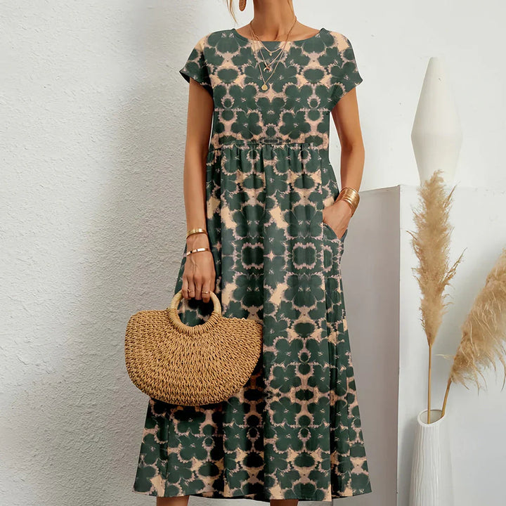 Stylish women's relaxed fit midi dress for everyday wear. Casual cap sleeve spring/summer dress.