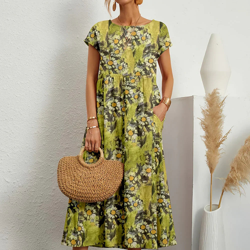 Women's casual midi dress. Relaxed fit, cap sleeves, round neck. Ideal for warm weather, everyday style.
