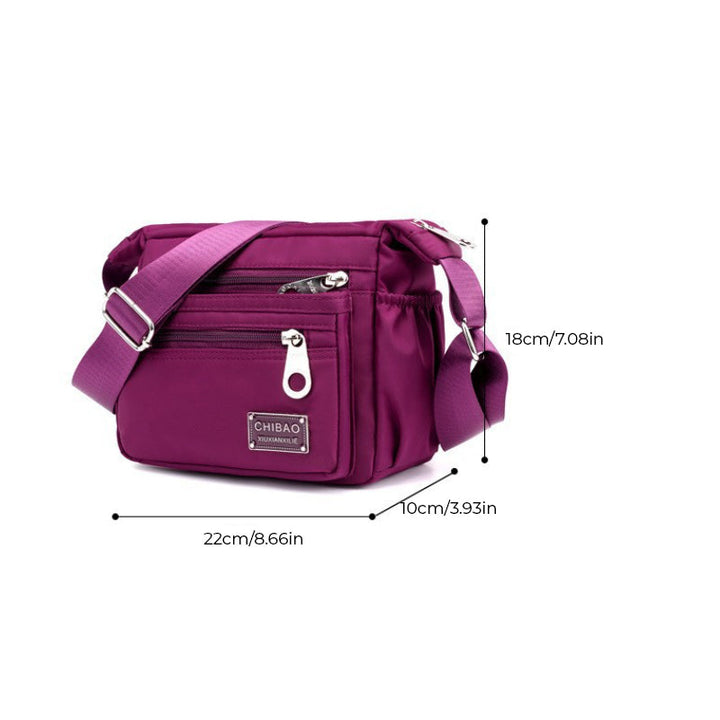 Women carrying a casual nylon crossbody shoulder bag, demonstrating comfortable wear & style
