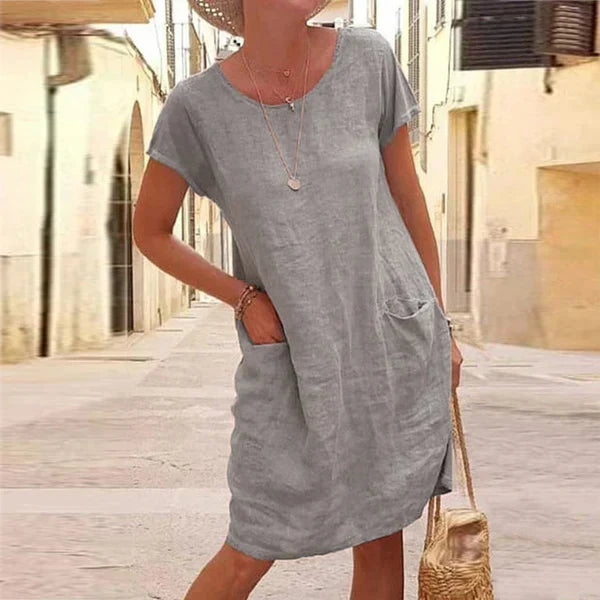 Versatile women's midi dress, short sleeve and casual with pockets. Ideal for summer and warm weather everyday style.
