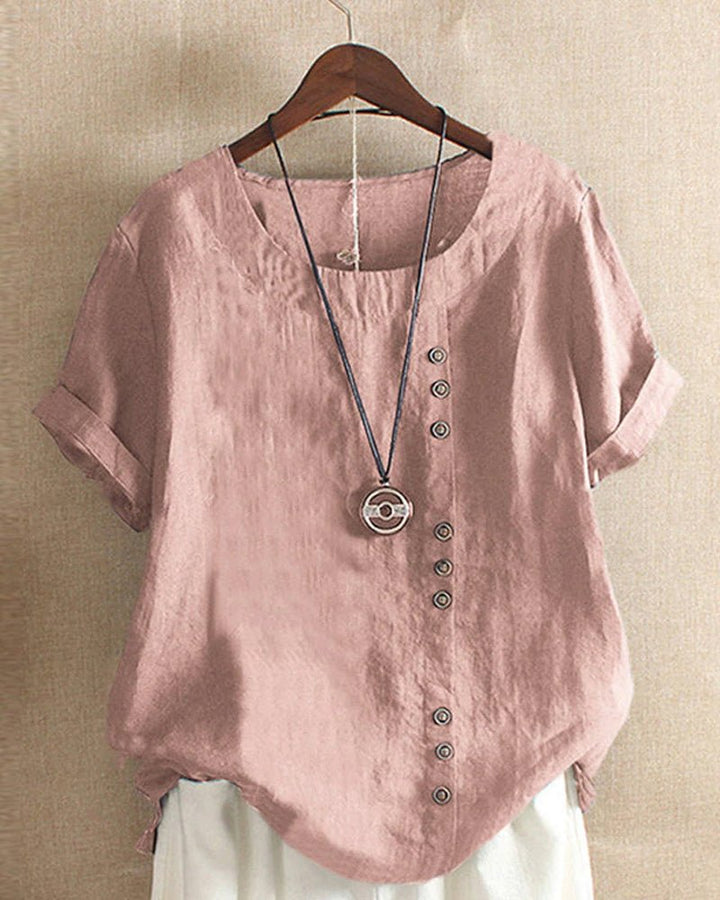 Women's casual short sleeve top with button front, crew neck, and curved hem. Perfect for spring & summer everyday wear.