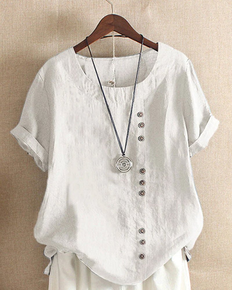 Relaxed fit women's short sleeve top, featuring a stylish button front. Ideal for versatile casual spring & summer outfits.