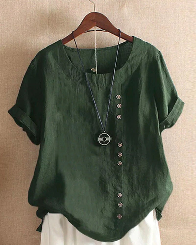 Comfortable women's short sleeve button-front top with crew neck. Essential everyday wear for spring and summer.