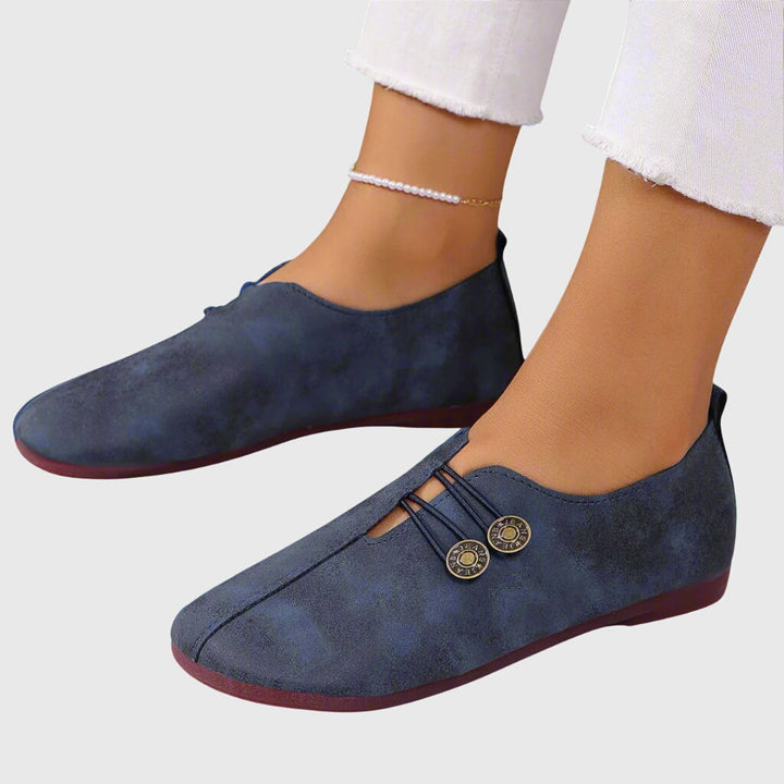 Stylish women's slip-on shoes featuring a button accent, versatile for spring and summer fashion
