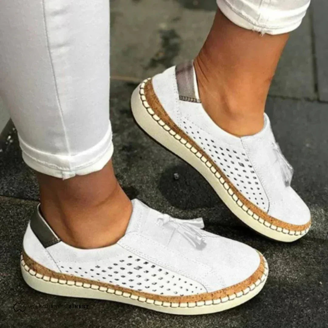 Flexible women's flats, slip-on style, offering comfort & ease for everyday spring fashion.
