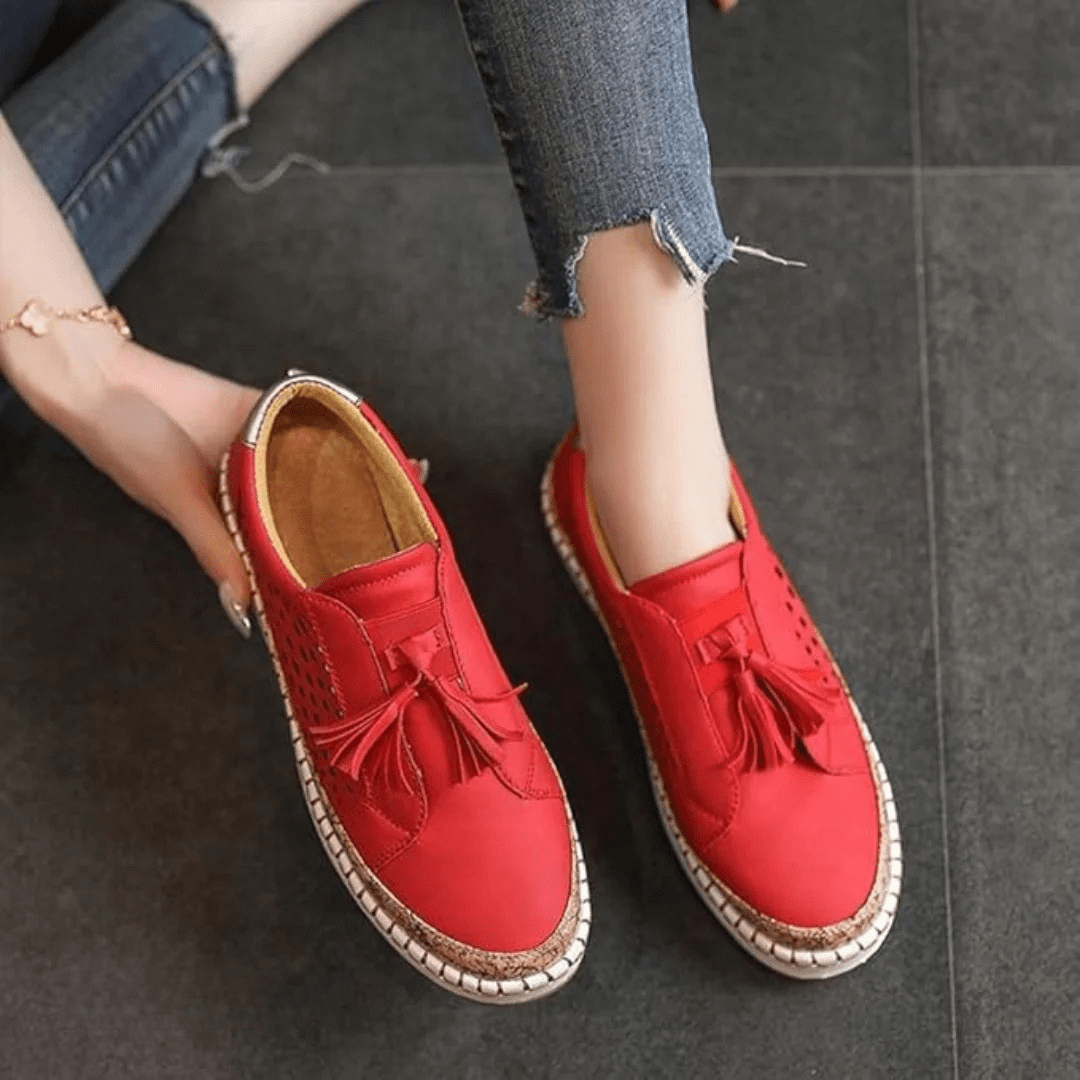Close-up of the detailed stitching on women's casual slip-on loafers, highlighting quality.