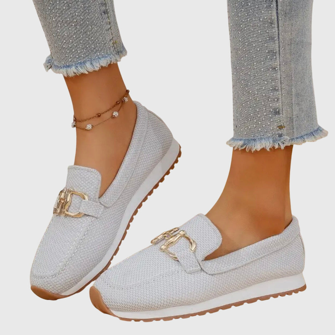 Chic women's flat slip-on loafers, perfect for adding a touch of casual elegance to any spring/summer look.