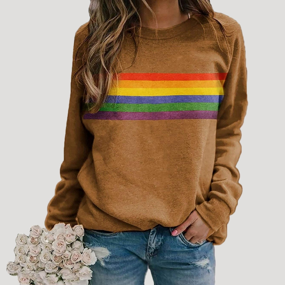 Comfortable women's spring sweatshirt showcasing bright rainbow stripes, a perfect pullover style