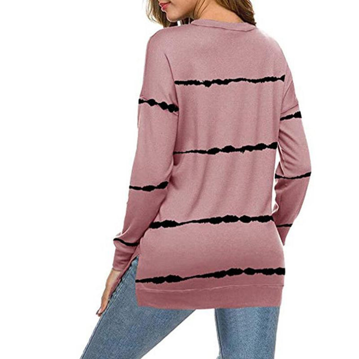 Women's striped long sleeve pullover sweatshirt paired with jeans, illustrating a casual look
