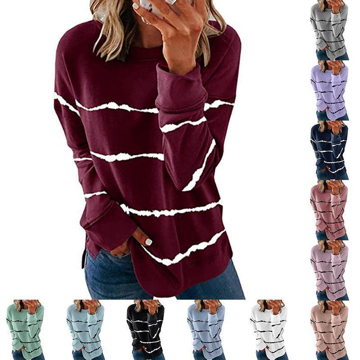 Elegant women's striped long sleeve top, pullover style, offering both comfort and fashion