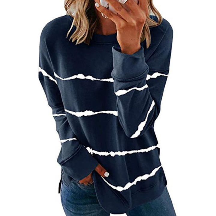 Back view of a women's striped long sleeve top, cotton blend material, everyday stylish sweatshirt