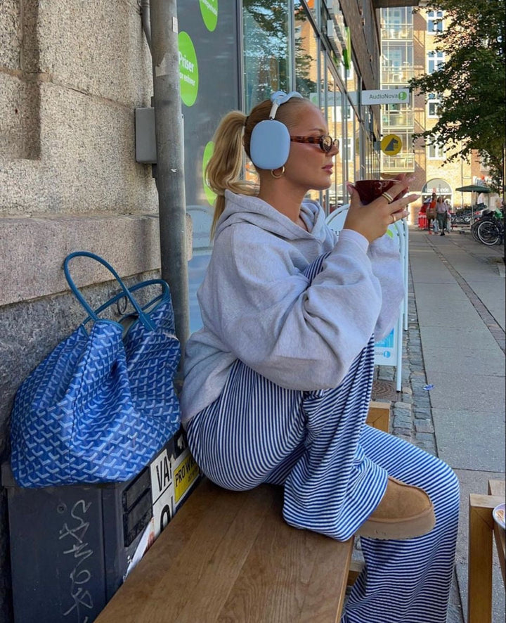 Striped women's casual pants with a relaxed fit, ideal for comfortable daily wear.