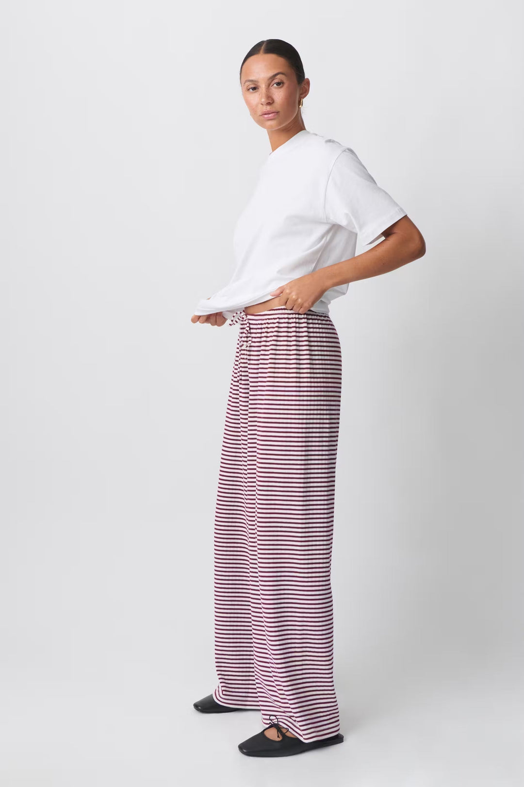 Casual women's striped trousers, offering a relaxed fit and comfortable feel for spring.