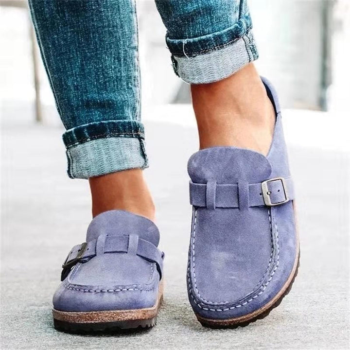 Soft suede women's orthopedic slip-on shoes with superior arch support.