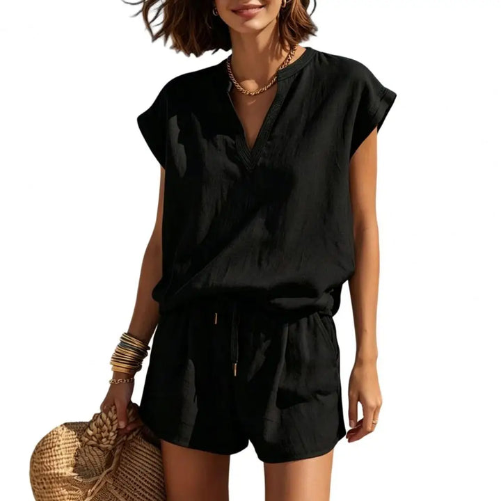 Stylish women's matching outfit: notch V-neck top & drawstring shorts. Perfect vacation clothes or resort wear.