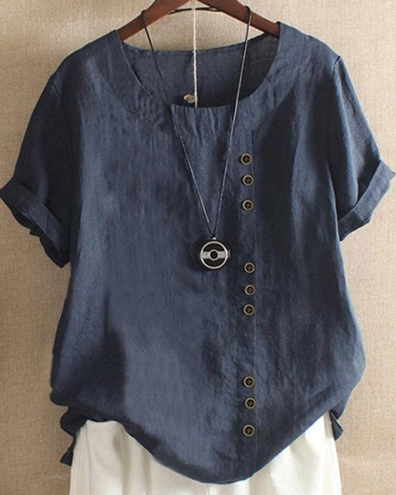 Relaxed fit women's short sleeve tunic blouse, ideal casual top for everyday comfort.