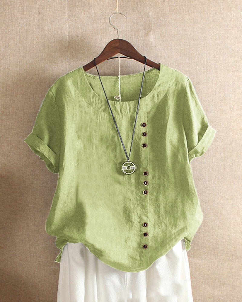 Comfortable women's summer tunic blouse, stylish short sleeve, button-up design.